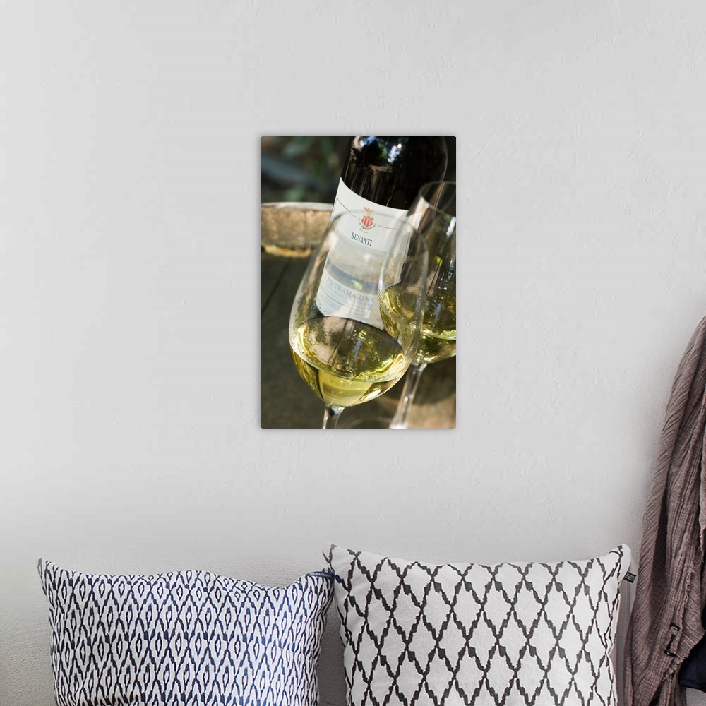 A bohemian room featuring Italy, Sicily, Mount Etna, Glass of white wine carricante Pietramarina