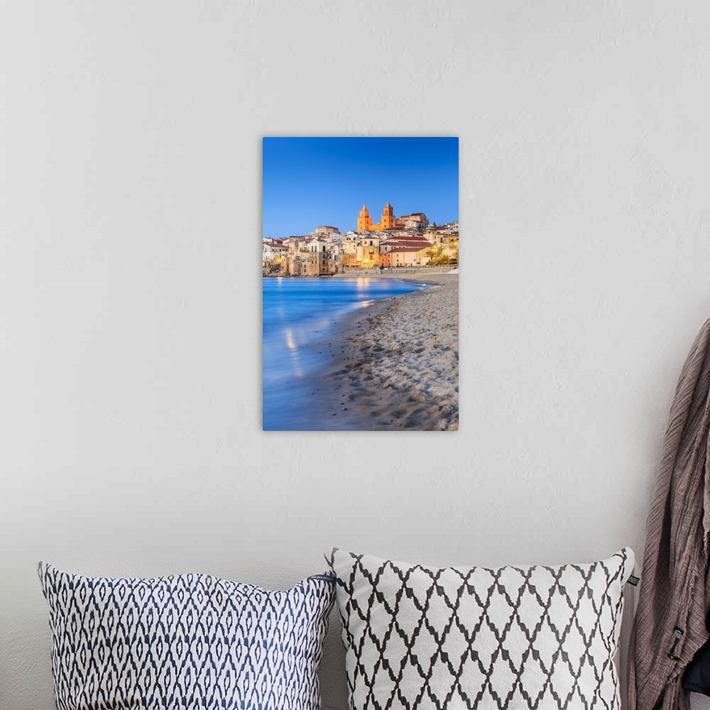 A bohemian room featuring Italy, Sicily, Palermo district, Cefalu, beach with the Cathedral in background