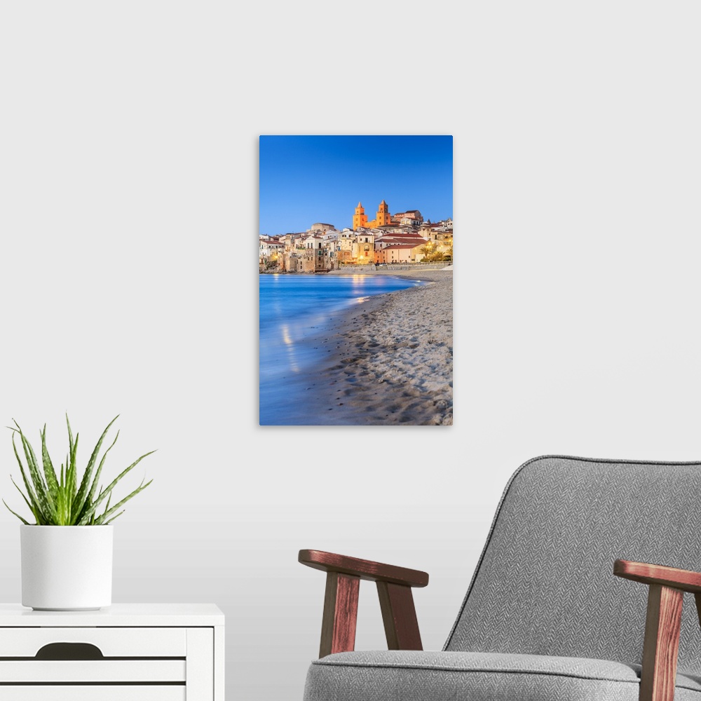 A modern room featuring Italy, Sicily, Palermo district, Cefalu, beach with the Cathedral in background