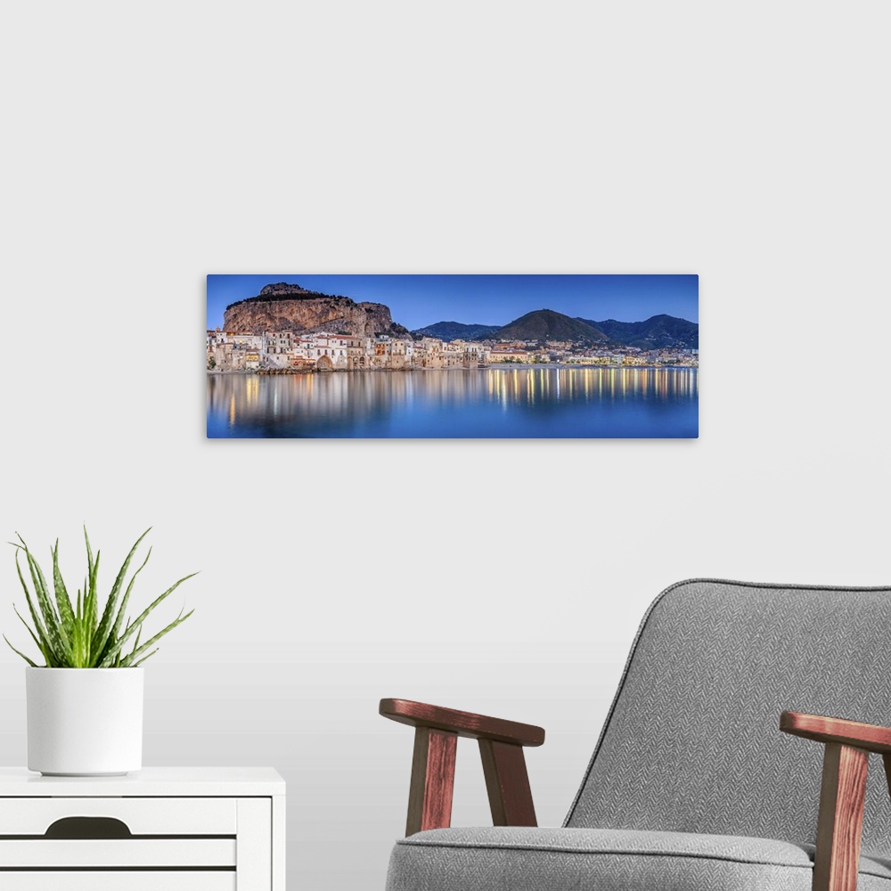 A modern room featuring Italy, Sicily, Palermo district, Cefalu, Harbor and old town at sunset