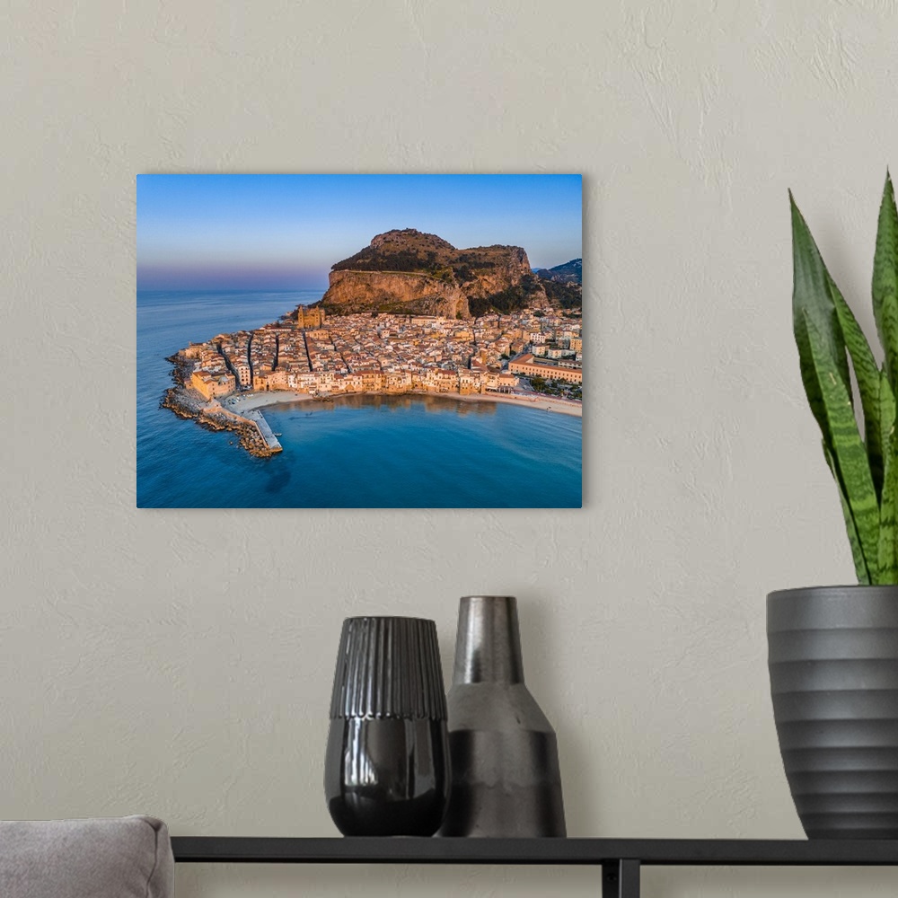 A modern room featuring Italy, Sicily, Palermo district, Cefalu, Mediterranean sea, Tyrrhenian sea, Aerial view.
