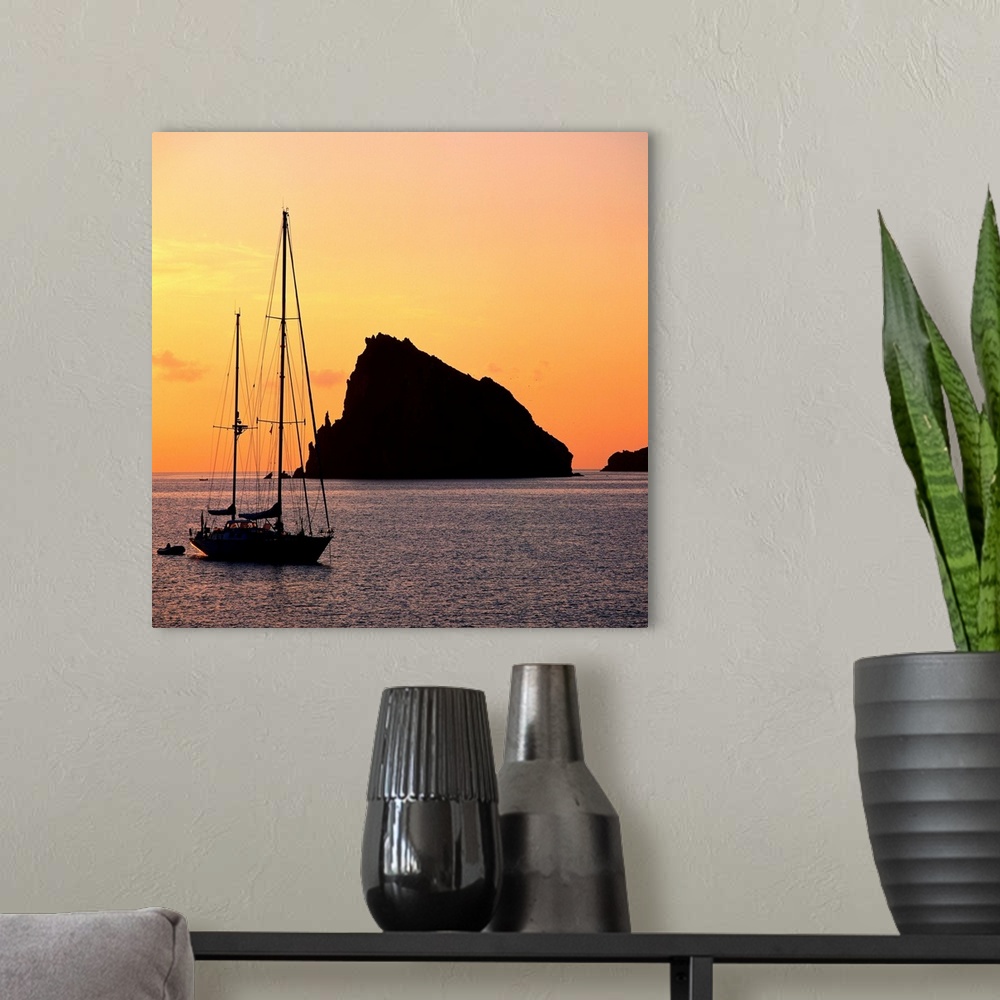 A modern room featuring Italy, Sicily, Panarea, Basiluzzo at sunset