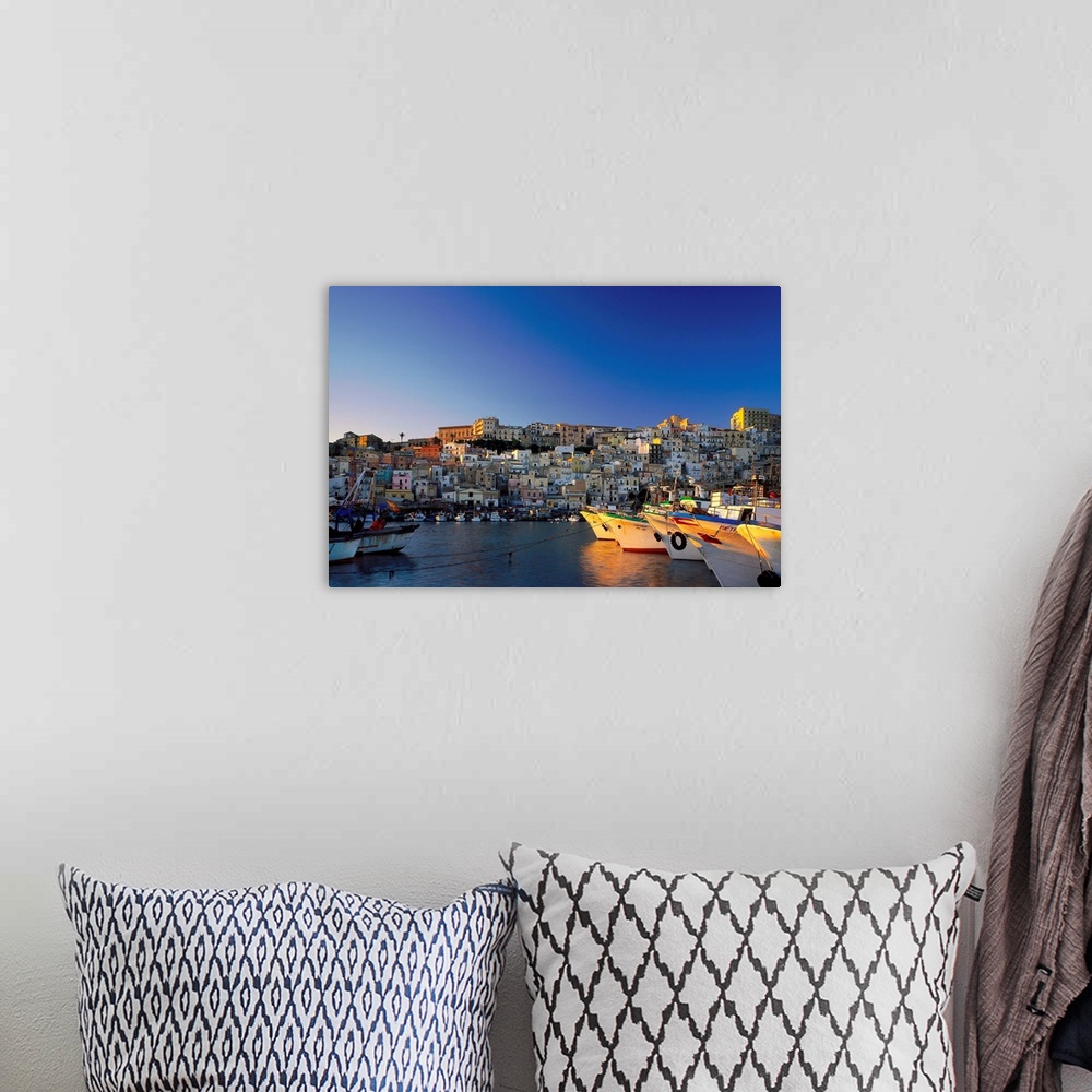 A bohemian room featuring Italy, Sicily, Sciacca, view of harbor
