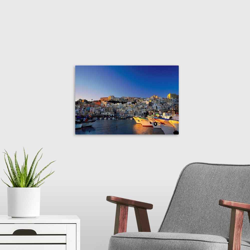 A modern room featuring Italy, Sicily, Sciacca, view of harbor