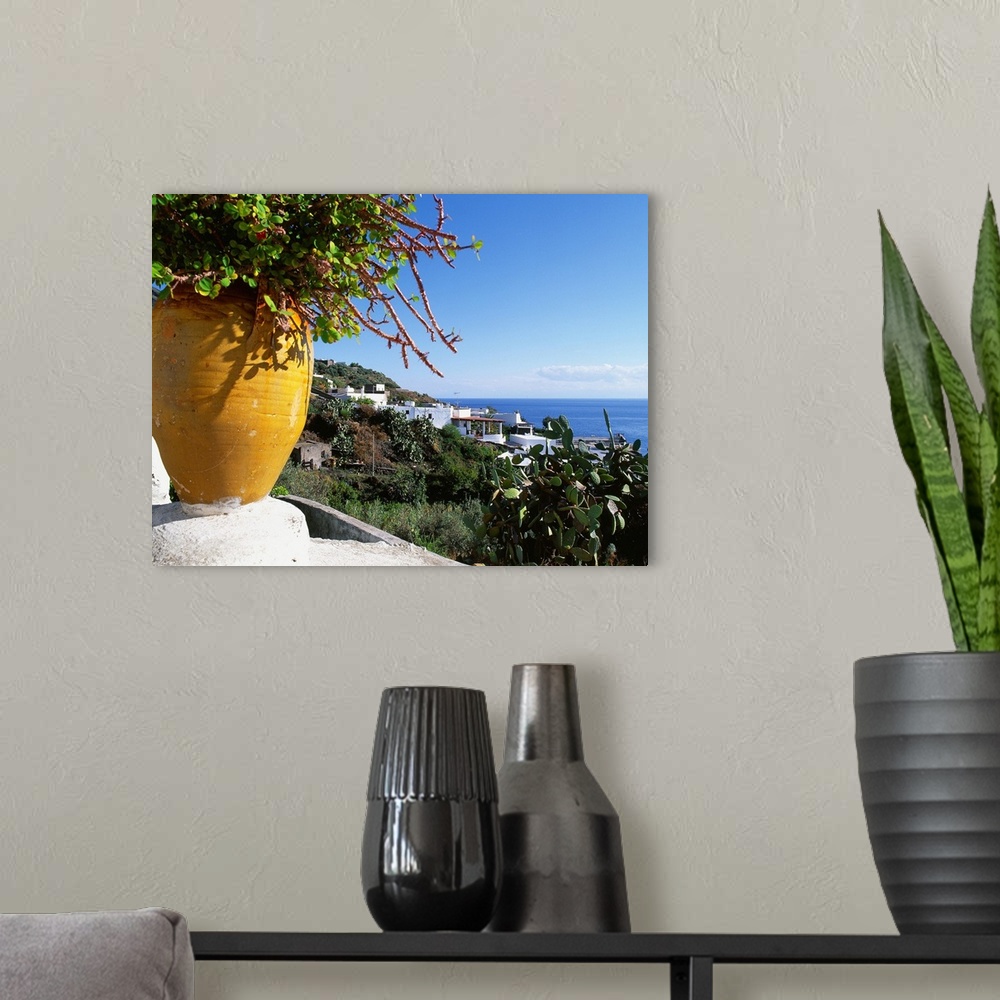 A modern room featuring Italy, Sicily, Stromboli island, view towards the village of Ginostra