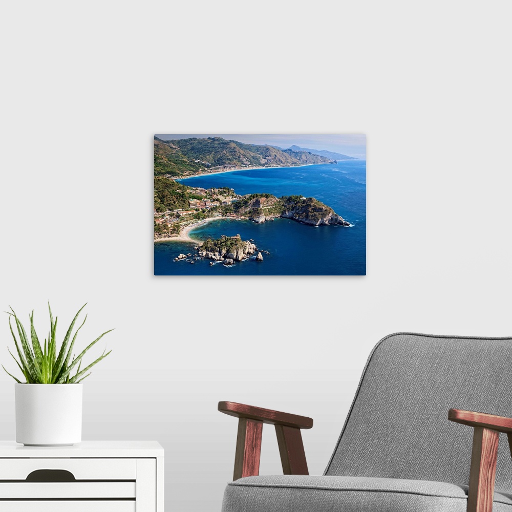 A modern room featuring Italy, Sicily, Mediterranean sea, Messina district, Taormina, Aerial view of Isola Bella and Sant...