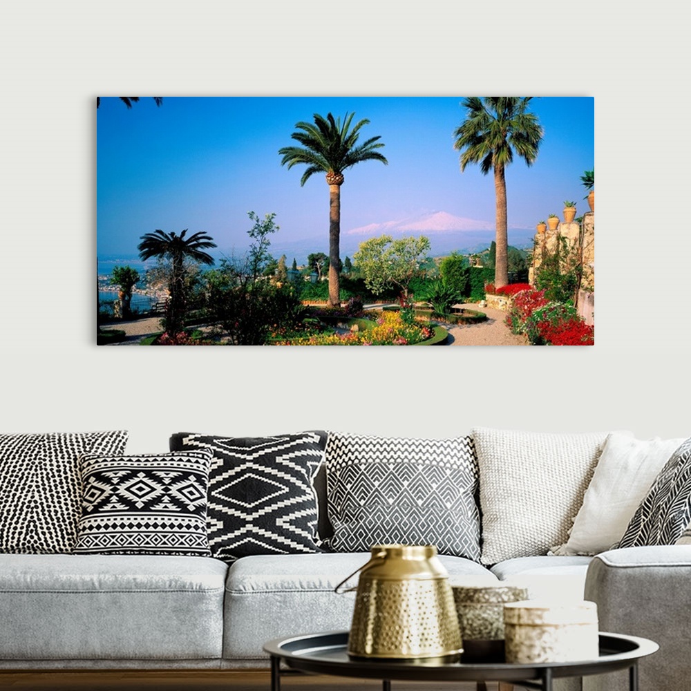 A bohemian room featuring Italy, Sicily, Taormina, Garden and Mount Etna in background