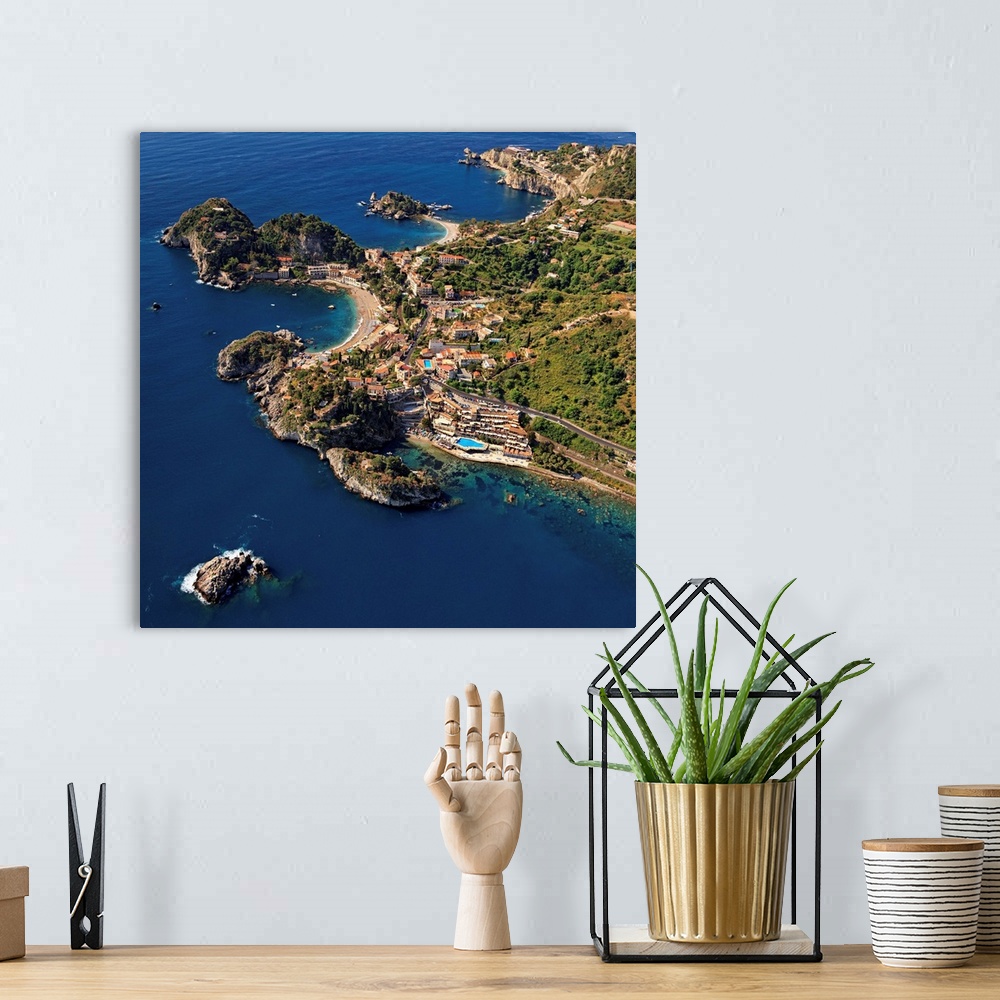 A bohemian room featuring Italy, Sicily, Mediterranean sea, Messina district, Taormina, Aerial view of Spisone bay, Mazzar....