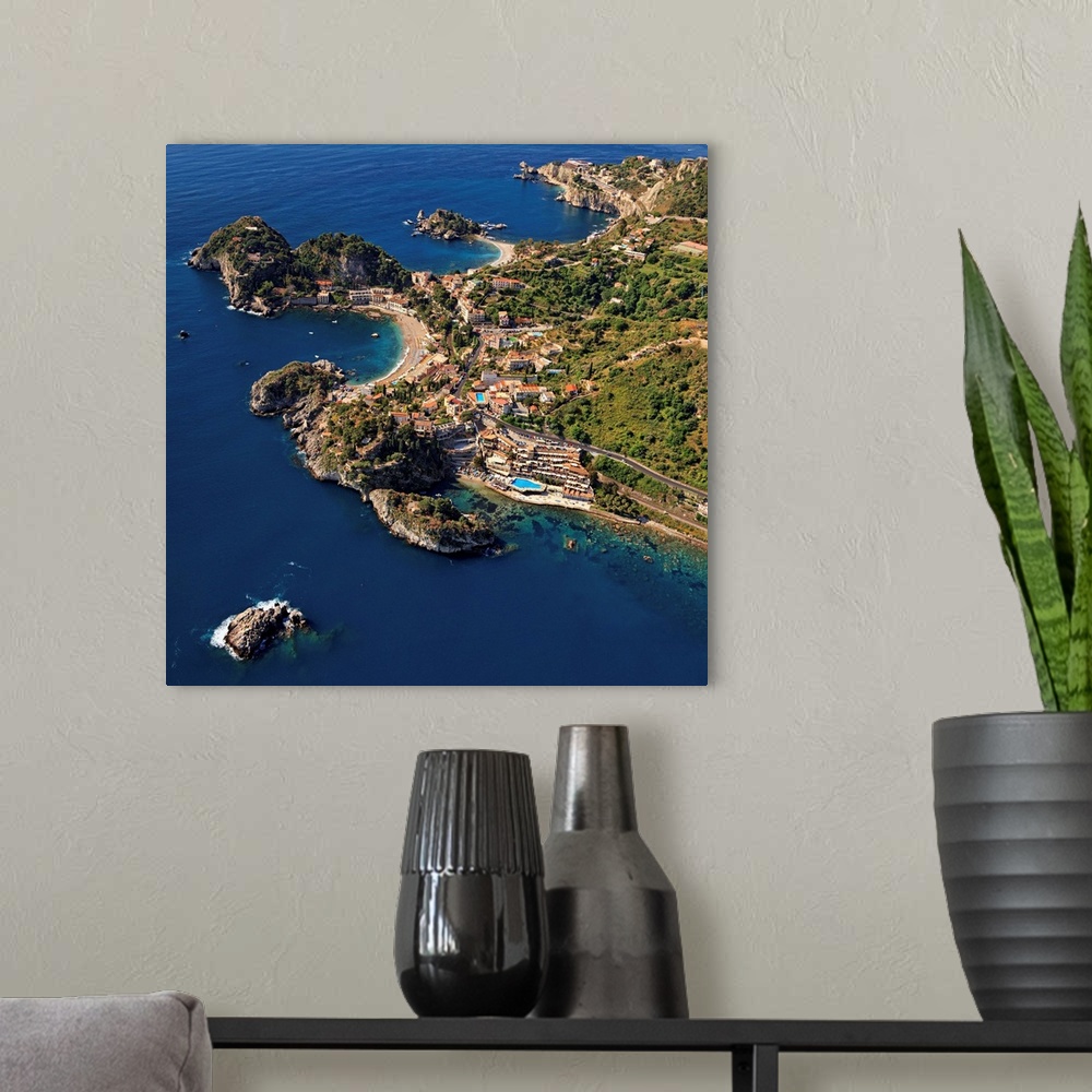 A modern room featuring Italy, Sicily, Mediterranean sea, Messina district, Taormina, Aerial view of Spisone bay, Mazzar....