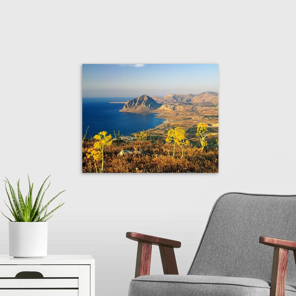 A modern room featuring Italy, Sicily, view from Erice towards Cofano Cape