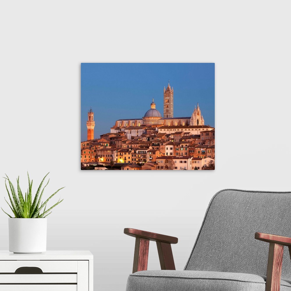 A modern room featuring Italy, Tuscany, Siena district, Siena, City at sunset with the cathedral in the background and To...