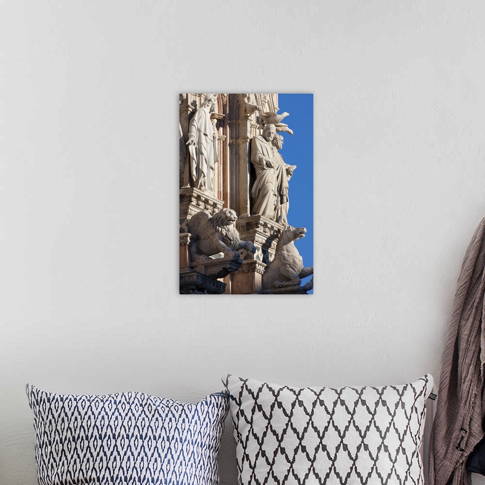 A bohemian room featuring Italy, Tuscany, Siena district, Siena, Facade detail of Santa Maria Assunta Cathedral.