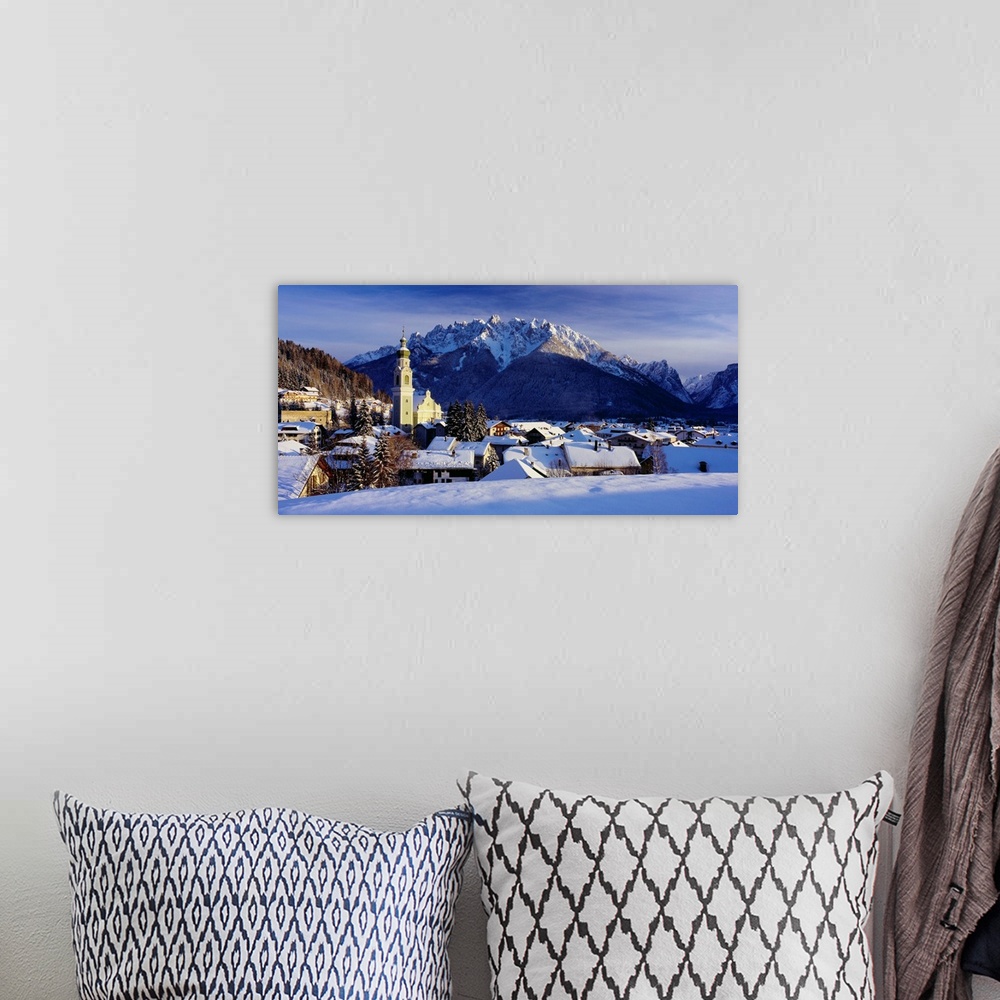 A bohemian room featuring Italy, South Tyrol, Alta Pusteria, Dobbiaco (Toblach) village