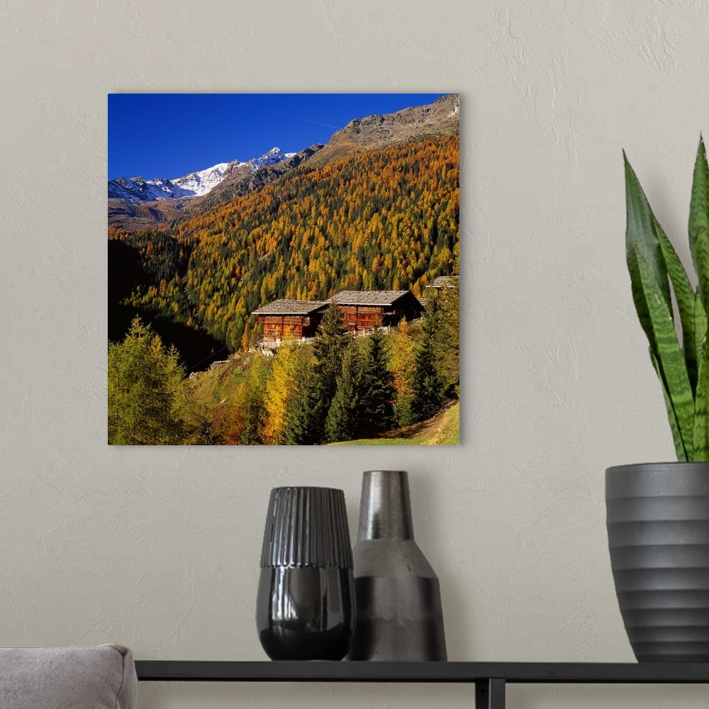 A modern room featuring Italy, South Tyrol, Bolzano, Val d'Ultimo, Santa Gertrude village, typical houses