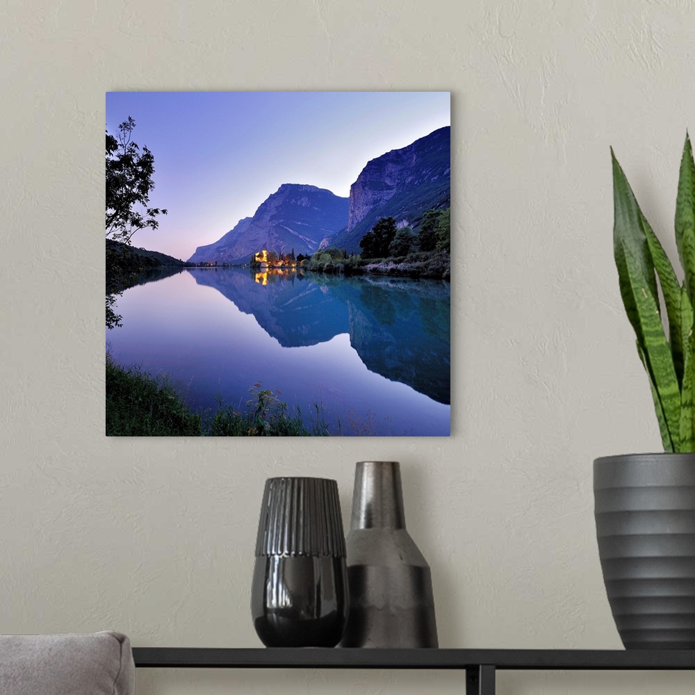 A modern room featuring Italy, Trentino-Alto Adige, Alps, Trentino, Lago di Toblino, Castle and lake at sunset