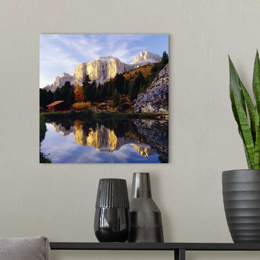 A modern room featuring Italy, Trentino Alto Adige, Dolomites, Lake and Gruppo Sella in background