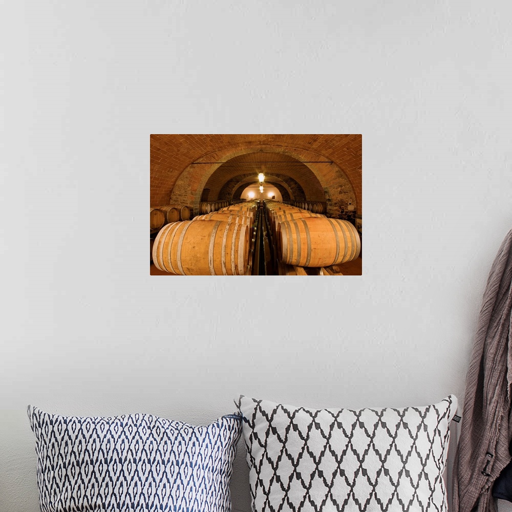 A bohemian room featuring One of the cellars of the Castello d'Albola, one of the biggest vineyards of the Chianti region, ...