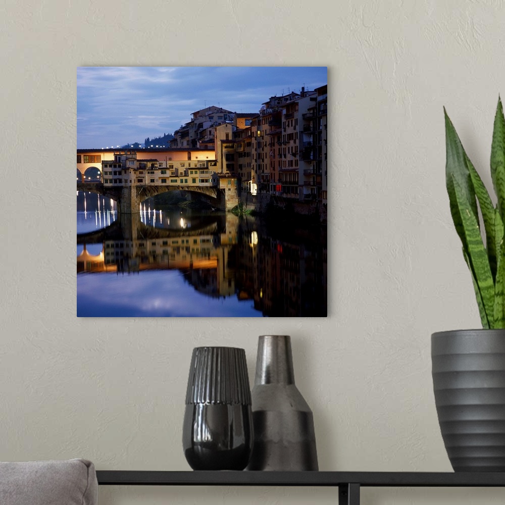 A modern room featuring Italy, Tuscany, Florence, Ponte Vecchio at twilight