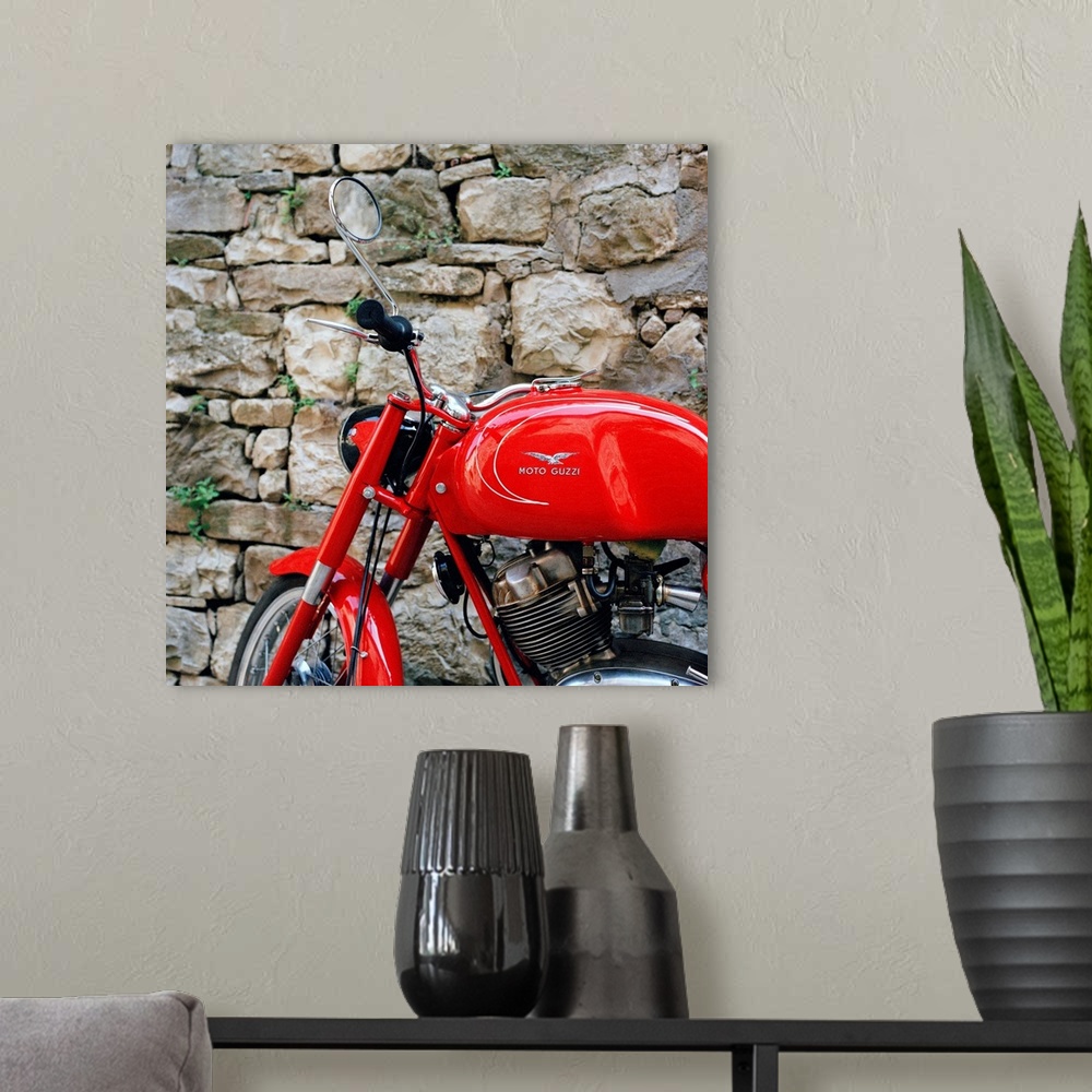 A modern room featuring Italy, Tuscany, Moto Guzzi Motorcycle