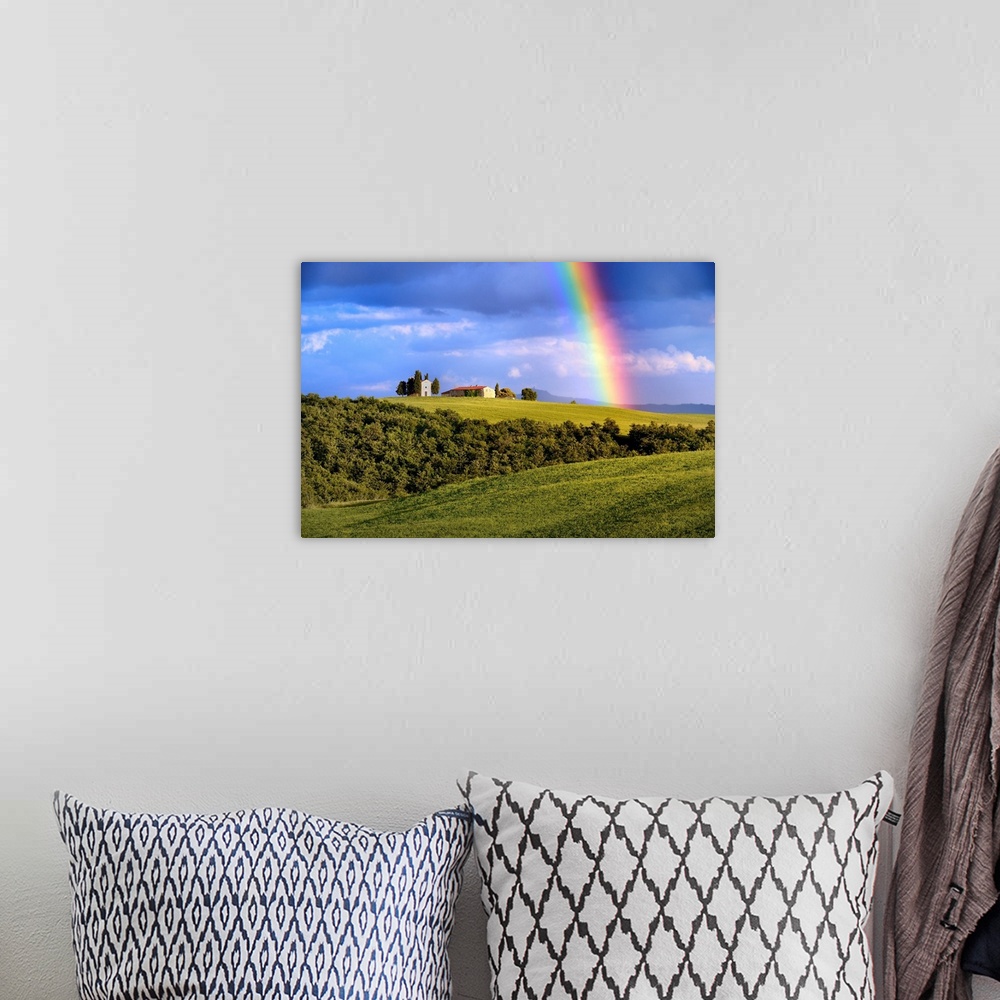 A bohemian room featuring Italy, Tuscany, Siena district, Orcia Valley, the Chapel of Vitaleta with a rainbow over it.