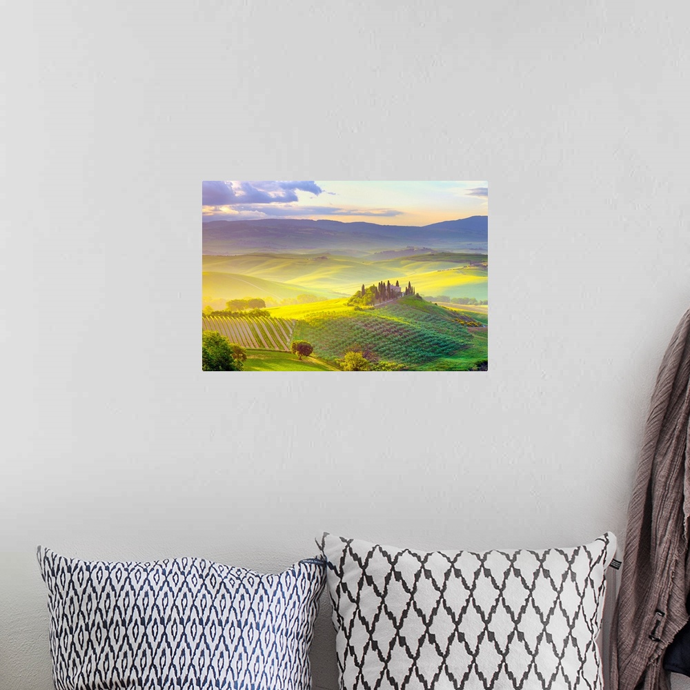 A bohemian room featuring Italy, Tuscany, Siena district, Orcia Valley, Tuscan landscape near San Quirico d Orcia at sunrise.
