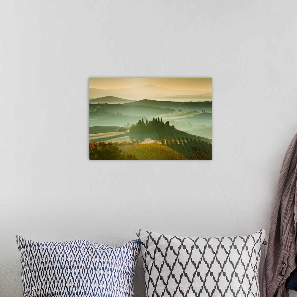 A bohemian room featuring Italy, Tuscany, San Quirico d'Orcia, Rolling landscape at dawn