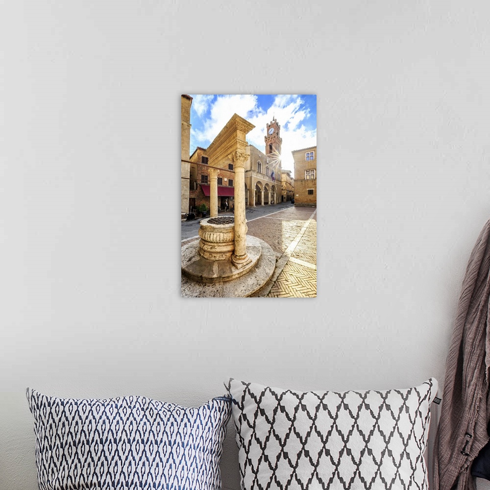 A bohemian room featuring Italy, Tuscany, Siena district, Orcia Valley, Pienza, Pozzo dei Cani in the town square