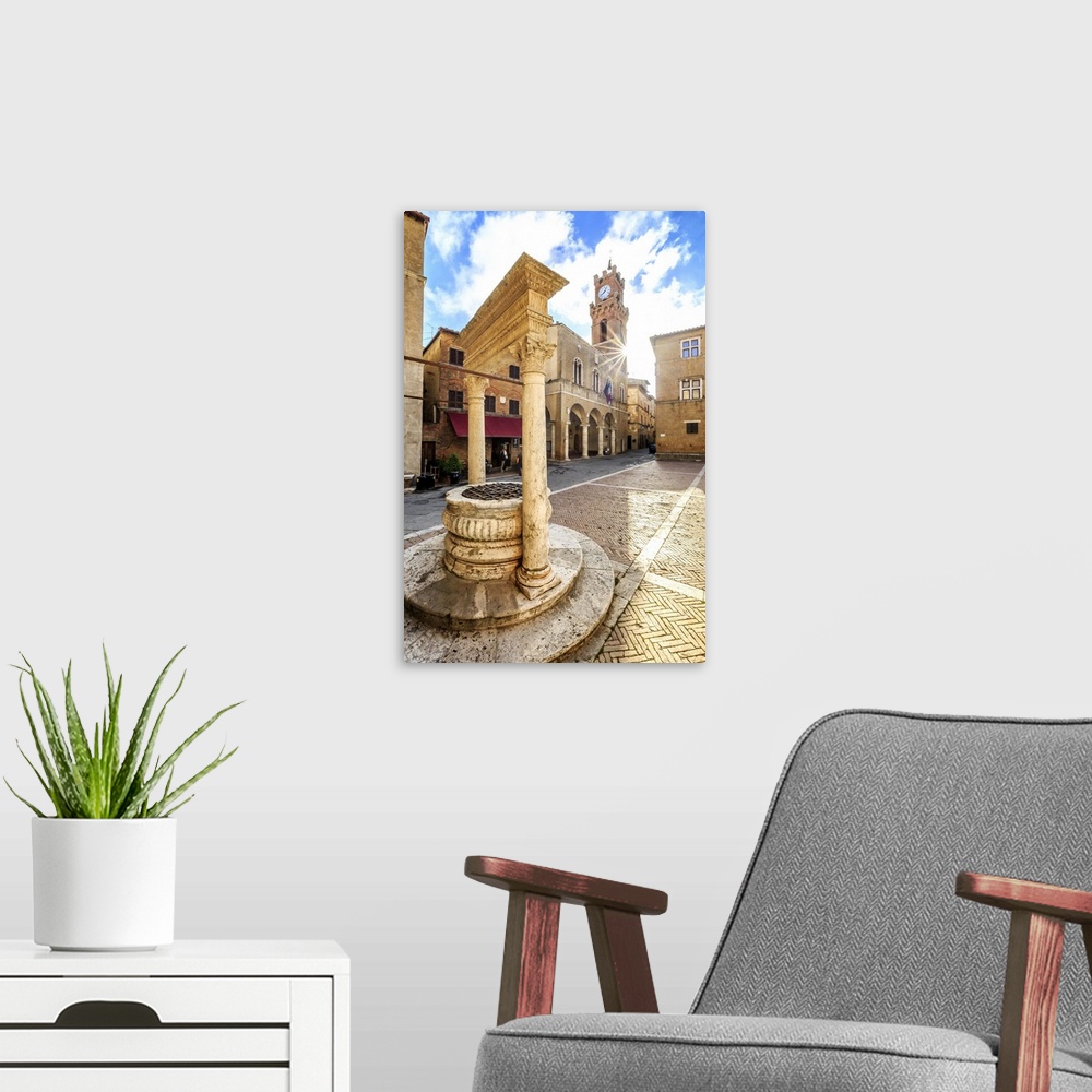 A modern room featuring Italy, Tuscany, Siena district, Orcia Valley, Pienza, Pozzo dei Cani in the town square