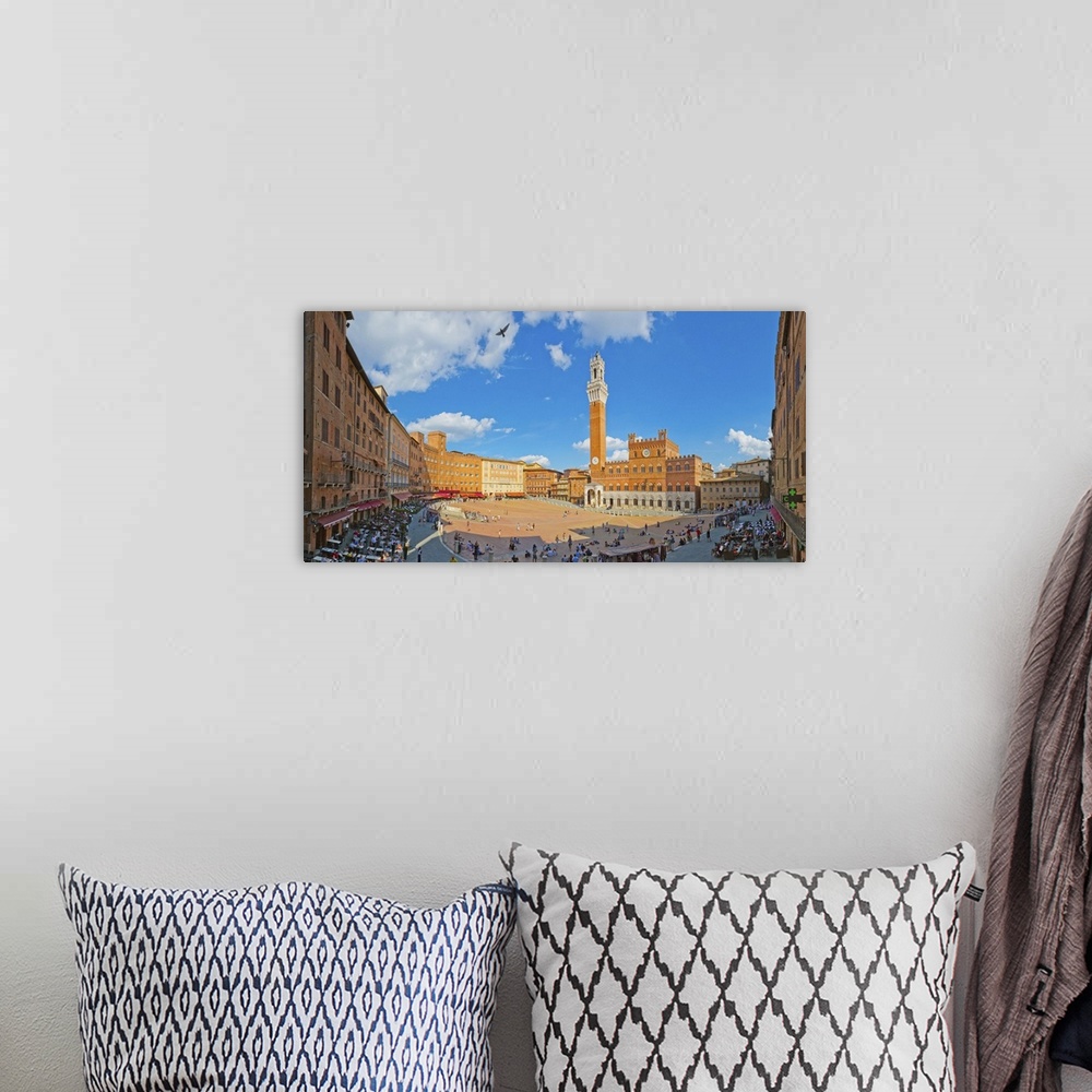 A bohemian room featuring Italy, Tuscany, Siena district, Siena, Piazza del Campo, Palazzo Pubblico and Torre del Mangia.