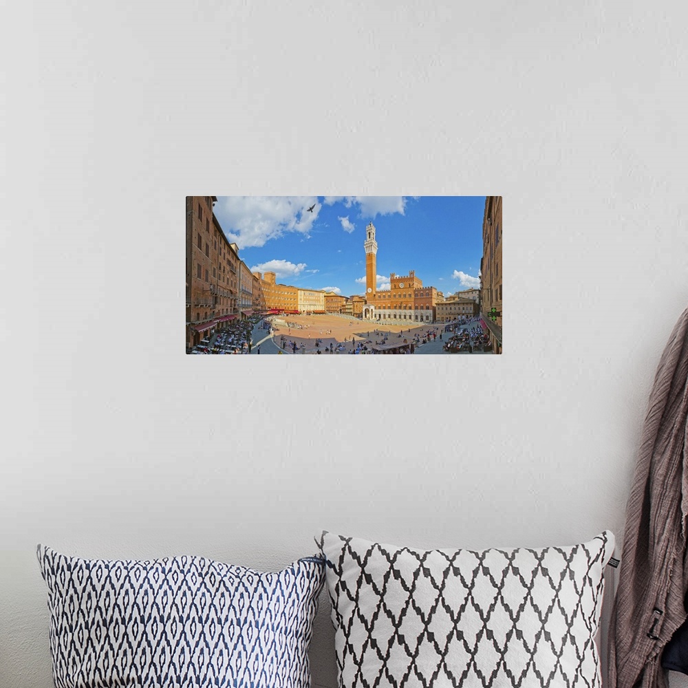 A bohemian room featuring Italy, Tuscany, Siena district, Siena, Piazza del Campo, Palazzo Pubblico and Torre del Mangia.