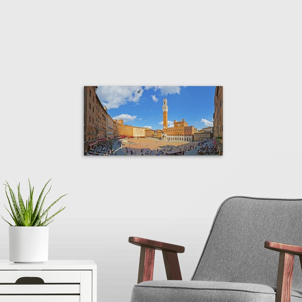 A modern room featuring Italy, Tuscany, Siena district, Siena, Piazza del Campo, Palazzo Pubblico and Torre del Mangia.