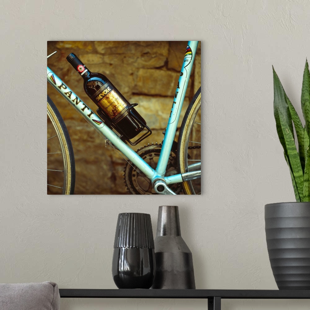 A modern room featuring Italy, Tuscany, Sports bicycle with Chianti bottle in bottle holder