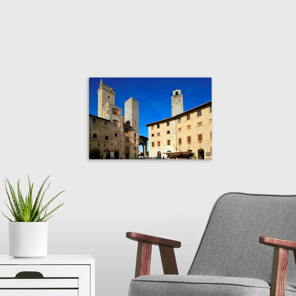 A modern room featuring Italy, Tuscany, Val d'Elsa, San Gimignano, Piazza della Cisterna