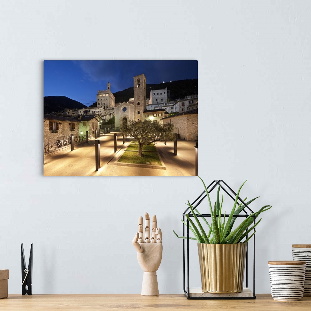 A bohemian room featuring Italy, Umbria, Mediterranean area, Perugia district, Gubbio, View of Piazza San Giovanni with San...