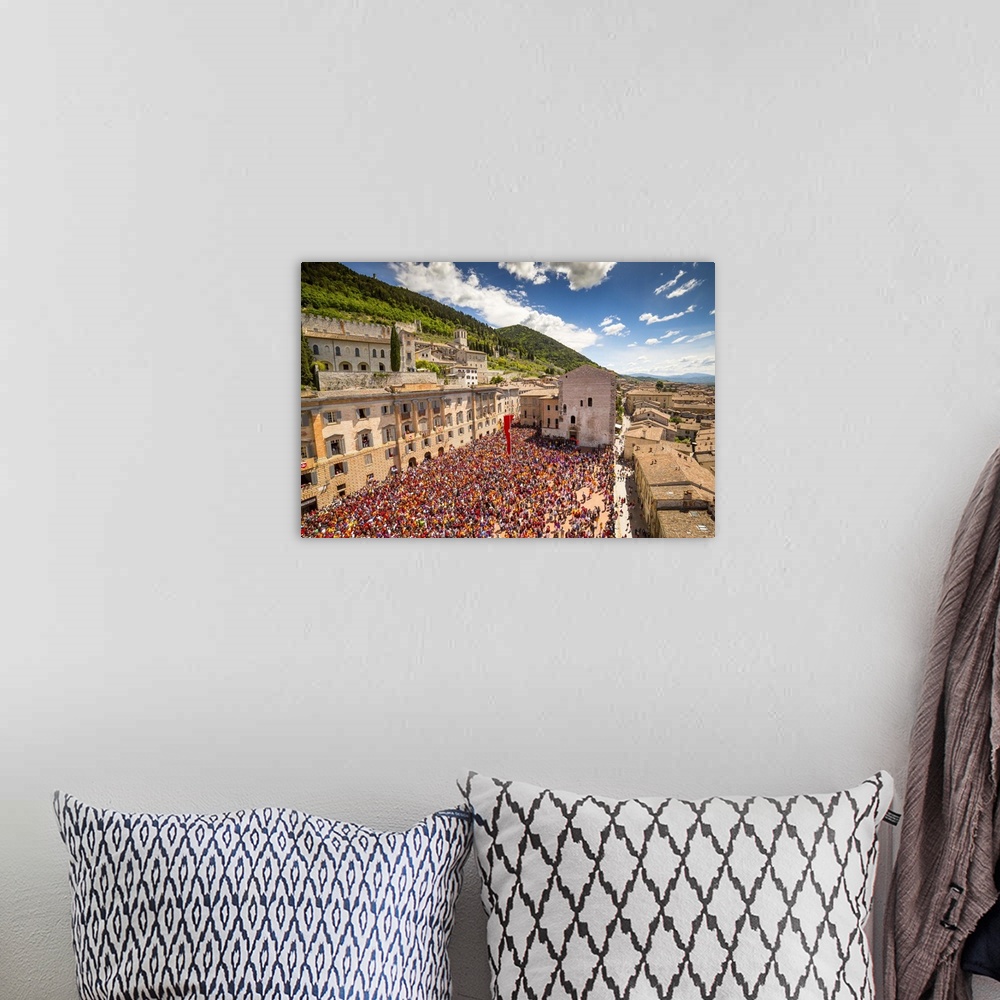 A bohemian room featuring Italy, Umbria, Perugia district, Gubbio, Race of the Candles.