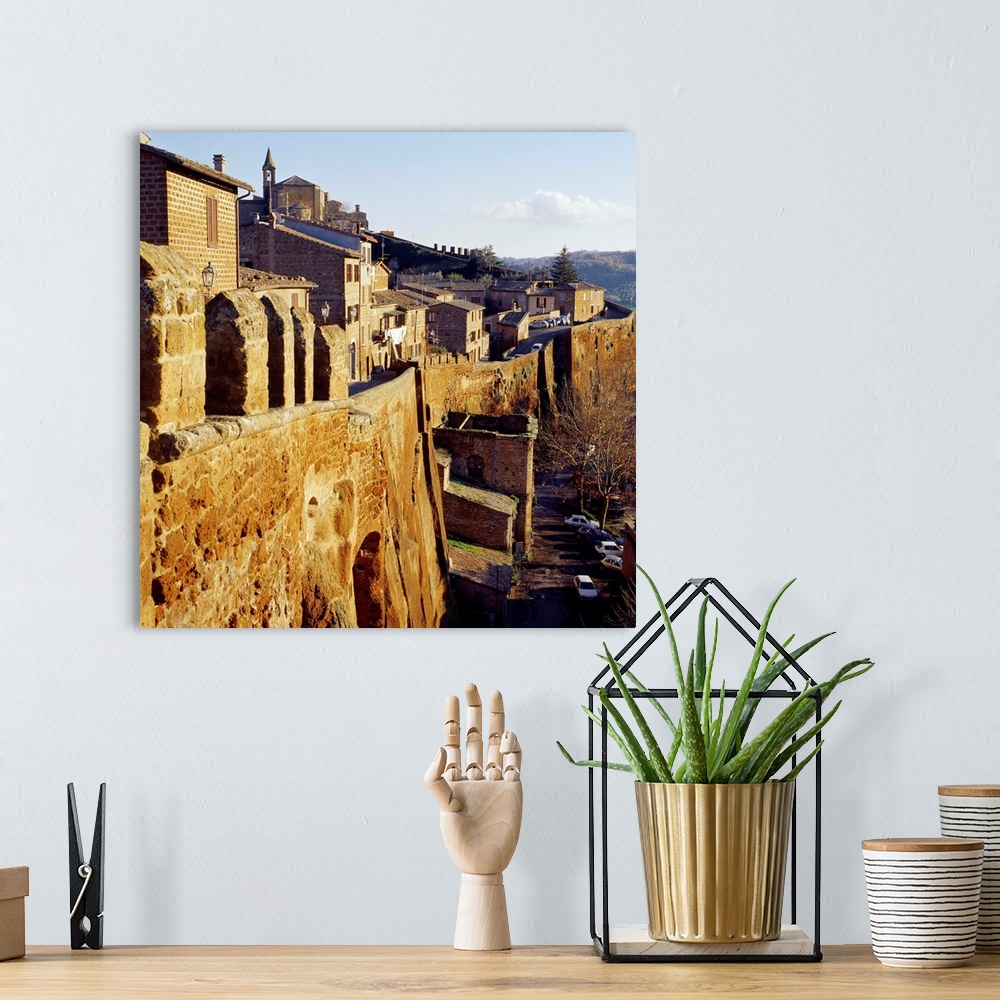 A bohemian room featuring Italy, Umbria, Orvieto, Outcropping of tuff, west side
