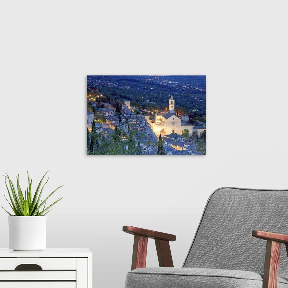 A modern room featuring Italy, Umbria, Perugia district, Assisi, The town at night from Major Rock
