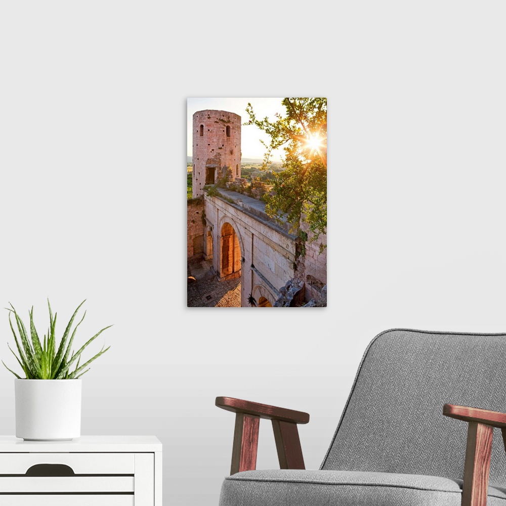 A modern room featuring Italy, Umbria, Mediterranean area, Perugia district, Spello, Porta Venere (gate) and Torri di Pro...