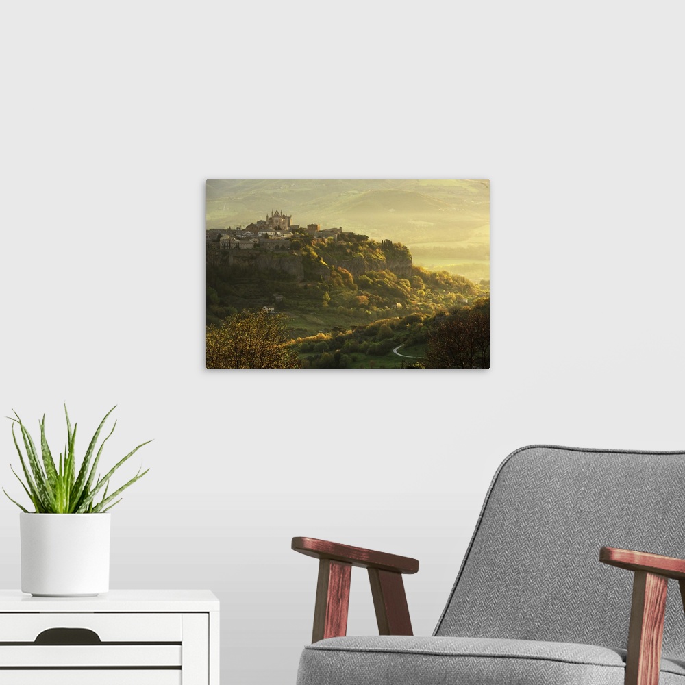 A modern room featuring Italy, Umbria, Terni district, Orvieto, Cathedral and the surrounding area at sunrise.