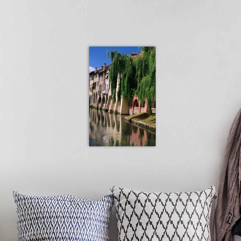 A bohemian room featuring Italy, Veneto, Treviso, Canale Buranelli (Buranelli canal)
