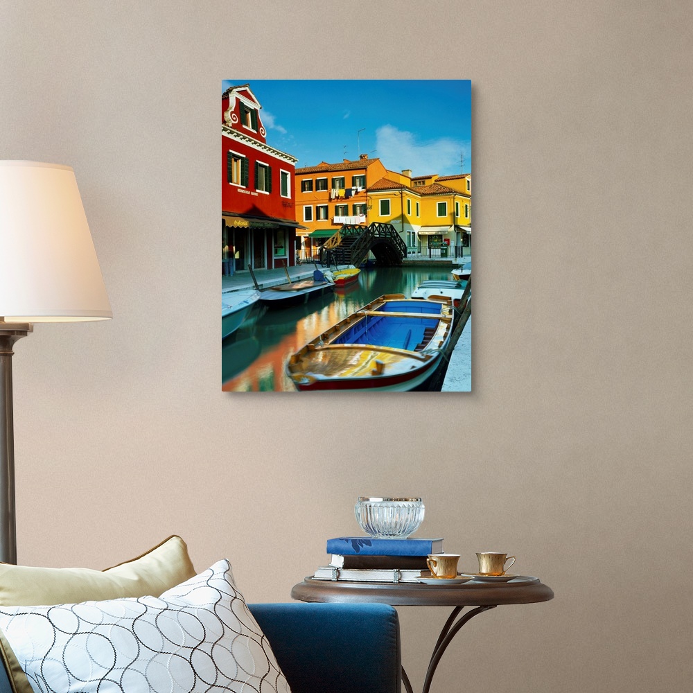 A traditional room featuring Italy, Venice, Island of Burano and typical homes along canal