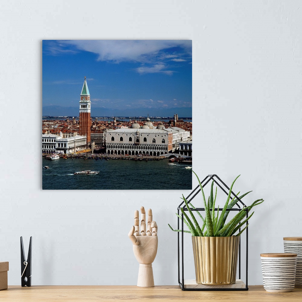 A bohemian room featuring Italy, Venice, Piazzetta, bell tower of Basilica di San Marco, Alps in background