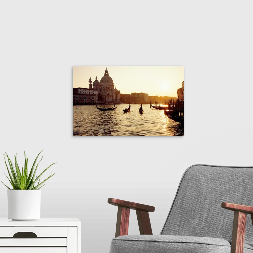 A modern room featuring Italy, Venice, Santa Maria della Salute church, sunset