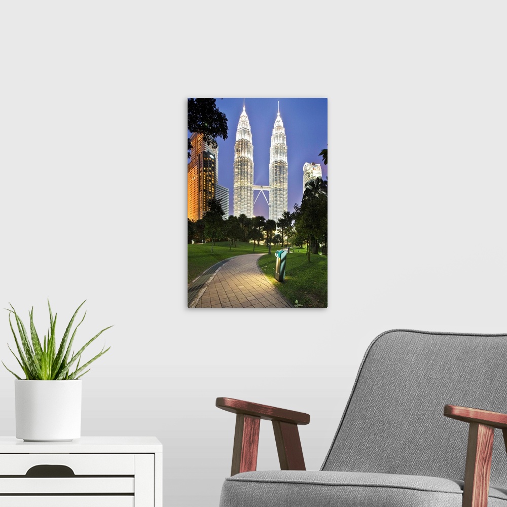 A modern room featuring Malaysia, Selangor, Kuala Lumpur, View of Petronas Towers from KL City Centre Park