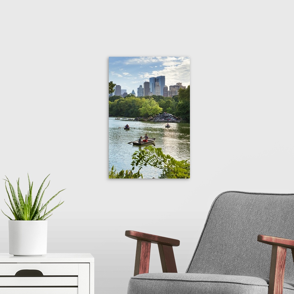 A modern room featuring USA, New York City, Manhattan, Central Park, Boats on the lake with Manhattan buildings in the ba...