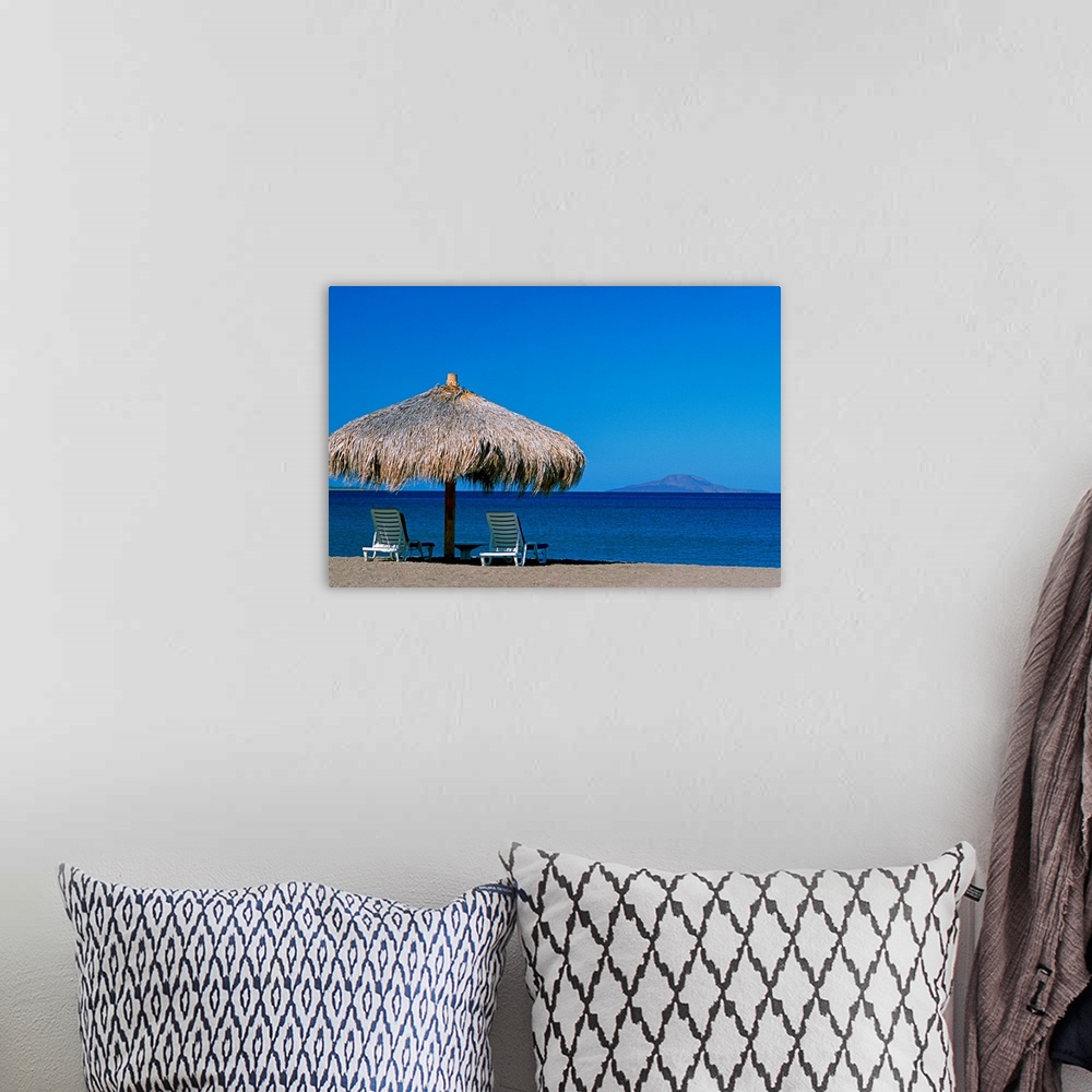 A bohemian room featuring Mexico, Baja California Sur, Sea of Cortez, beach umbrella and lounge chairs
