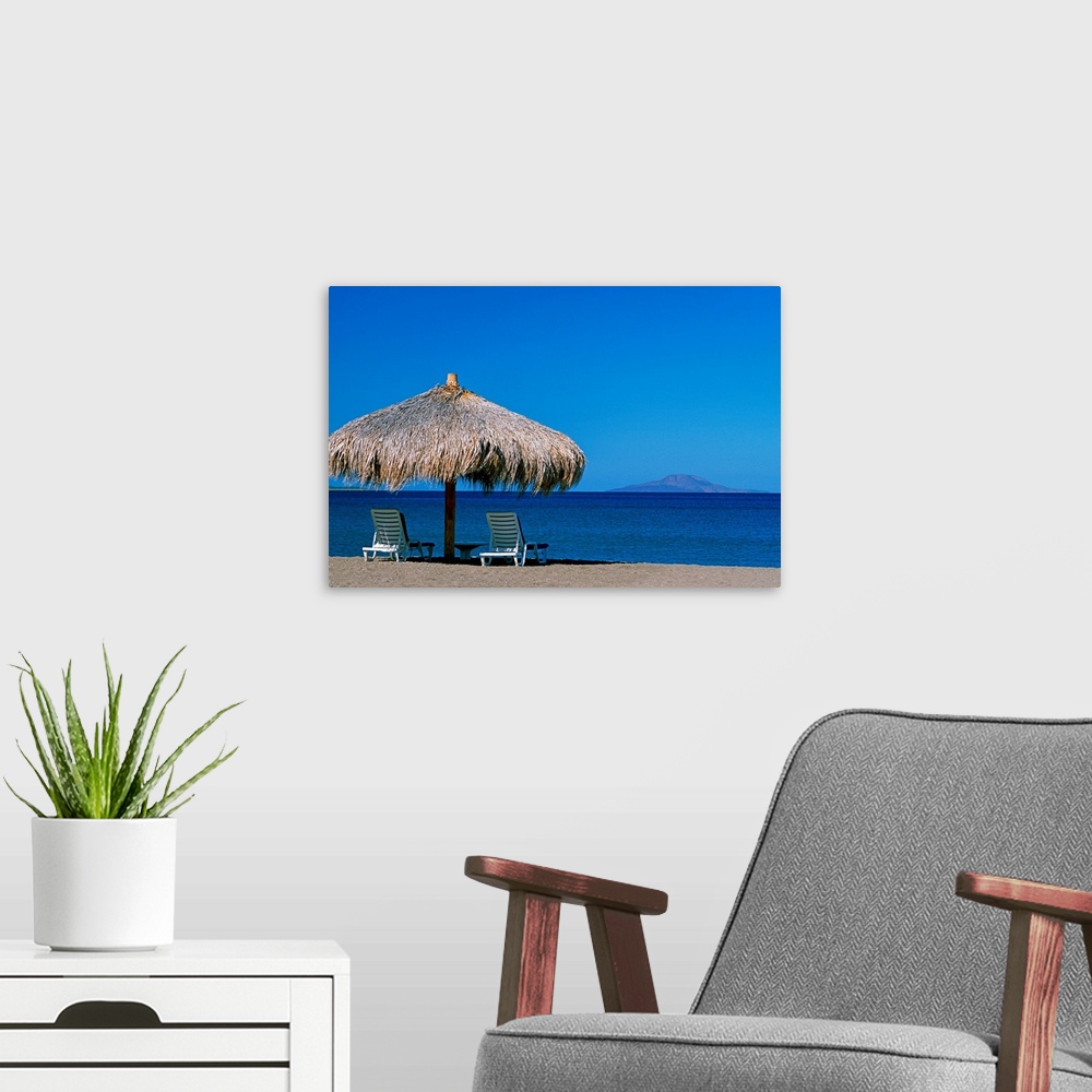 A modern room featuring Mexico, Baja California Sur, Sea of Cortez, beach umbrella and lounge chairs