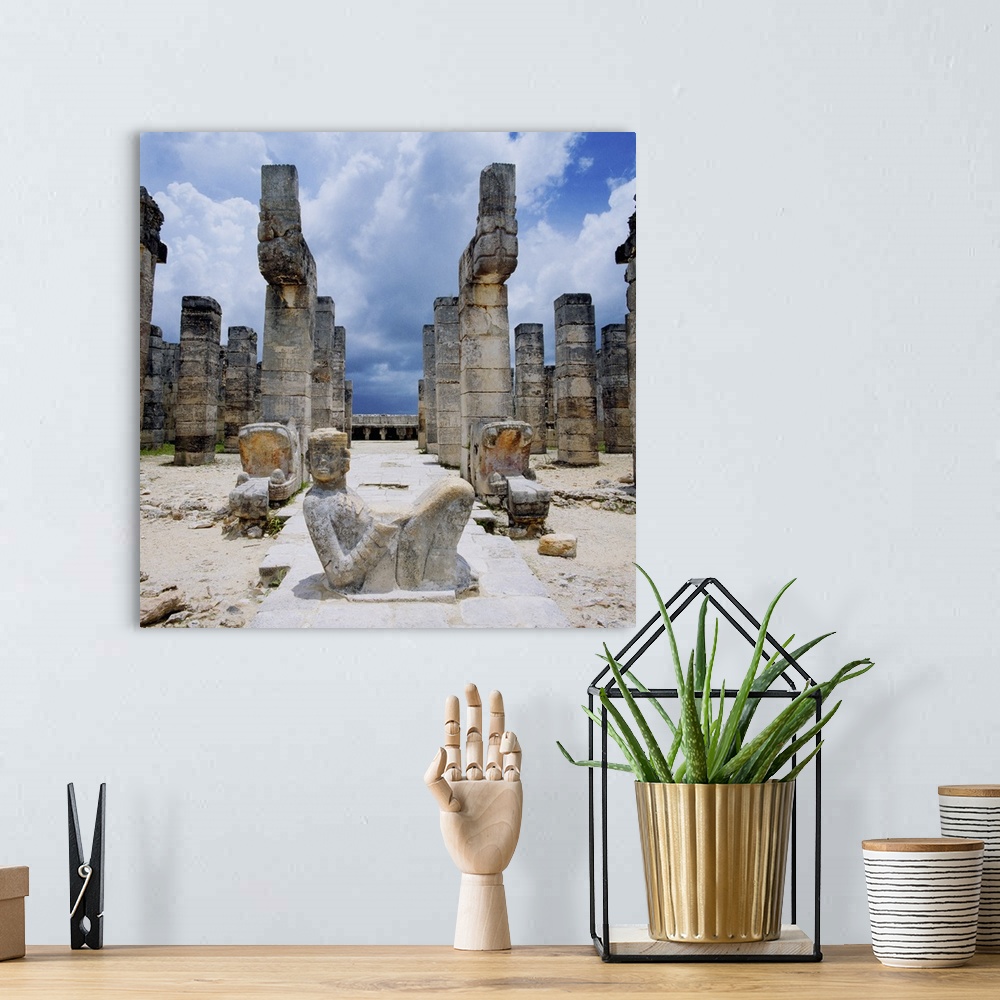 A bohemian room featuring Mexico, Yucatan, Chichen Itza, Temple of the Warriors, statue of Chac Mool