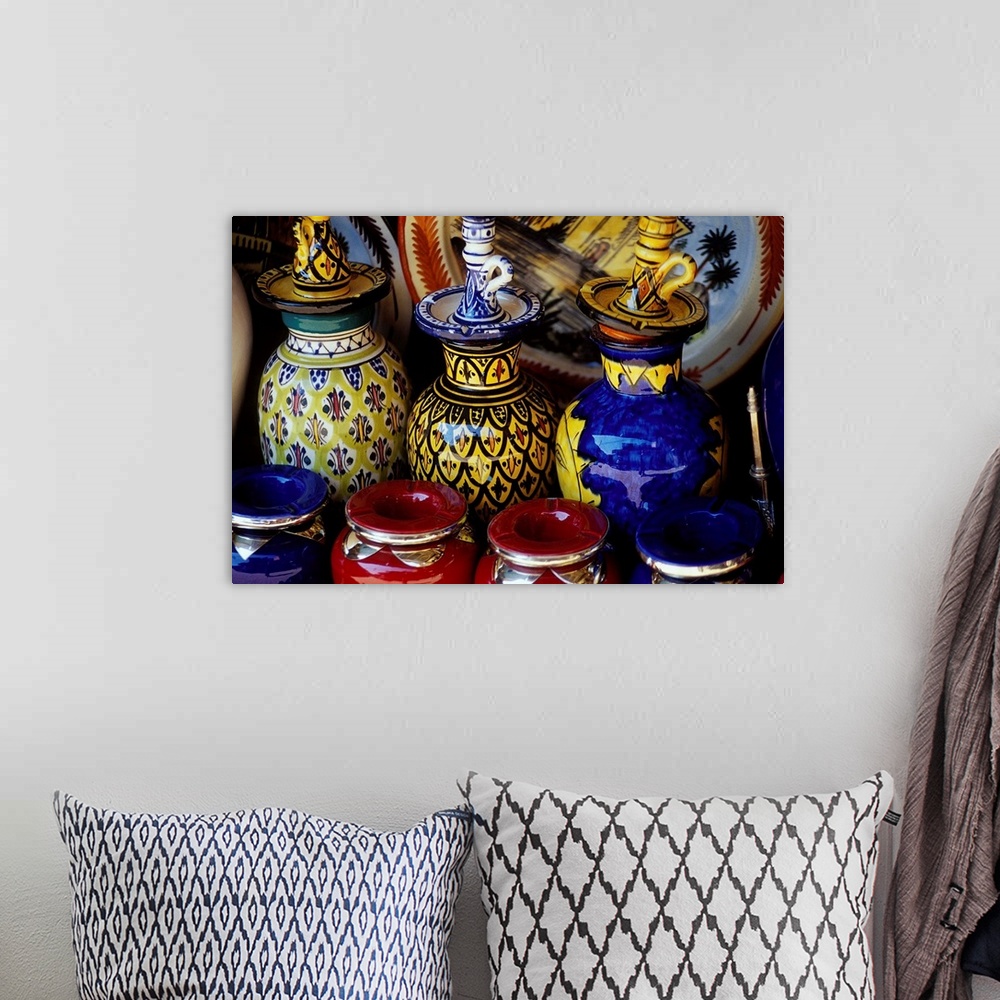 A bohemian room featuring Morocco, Marrakech, Moroccan pottery