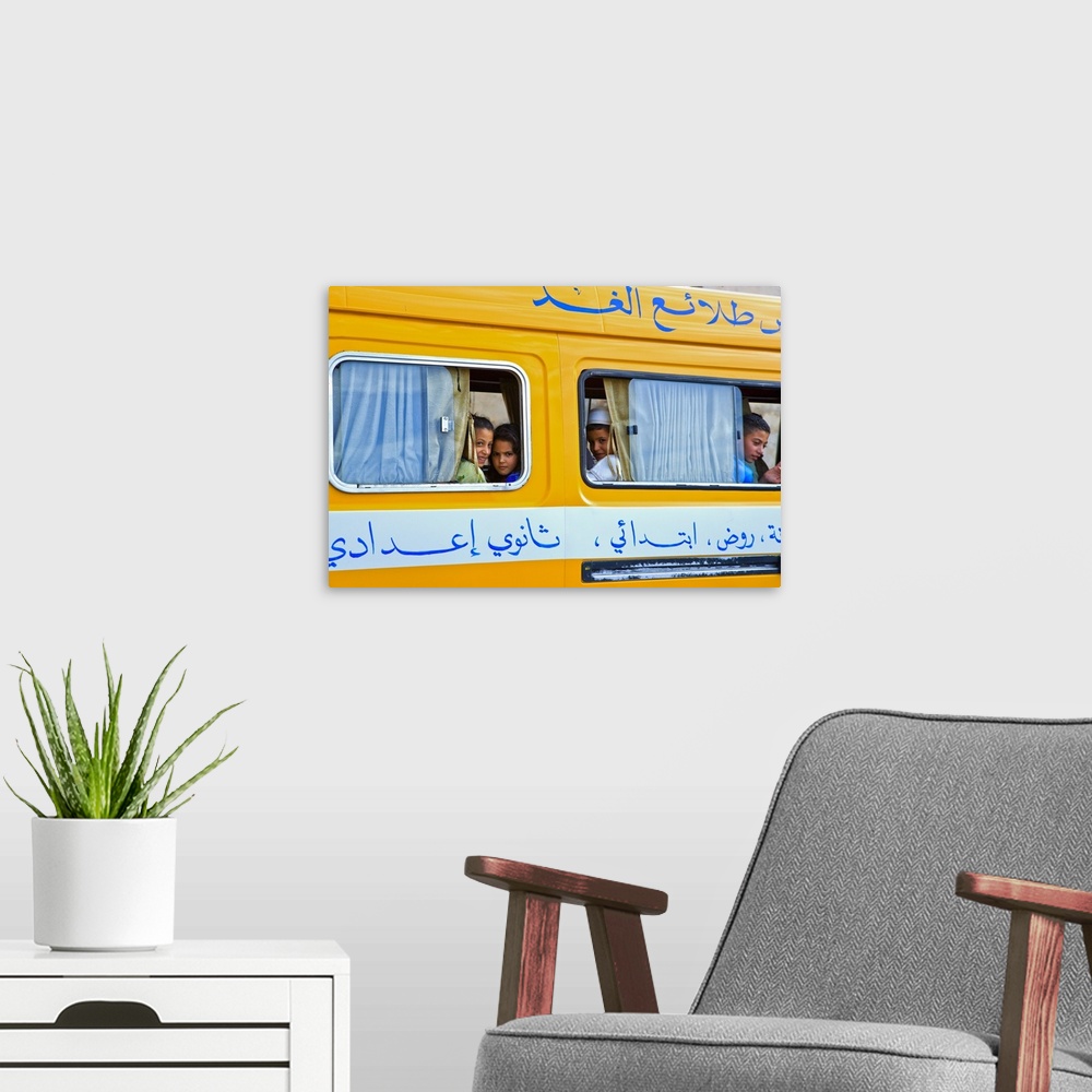 A modern room featuring Morocco, Meknes, Children in local bus